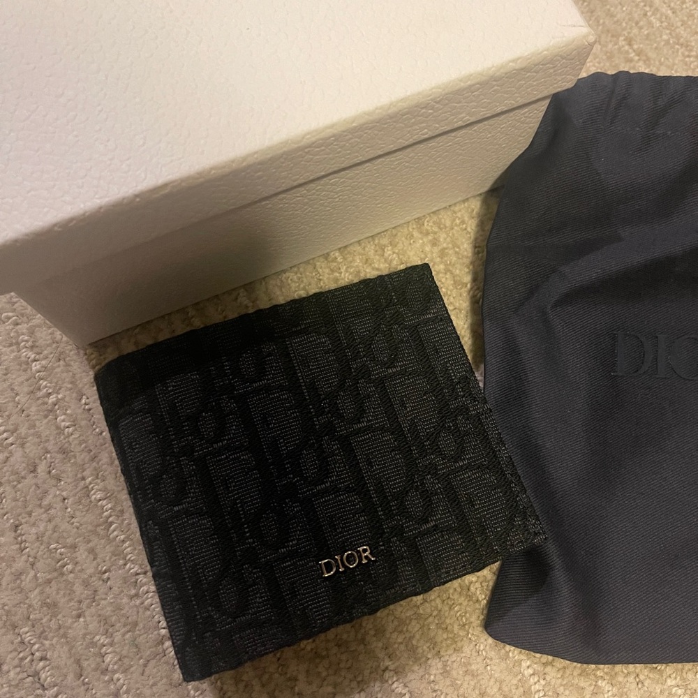 Dior mens wallet - brand new. Never been used.